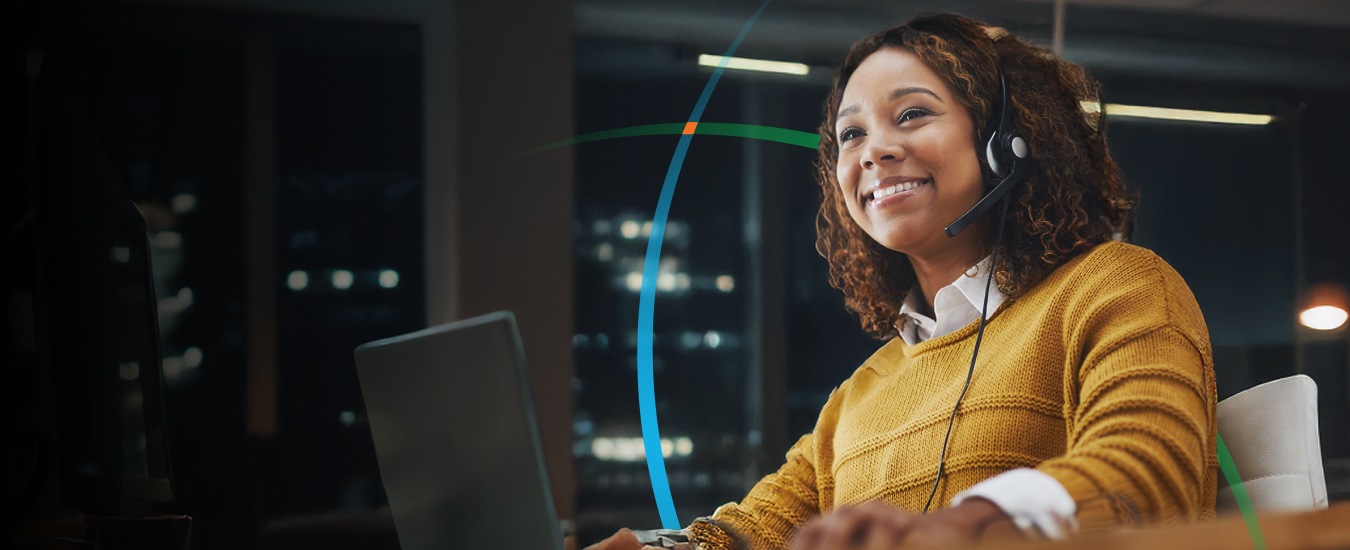 banner showing a woman with a headset smiling while working on her laptop 