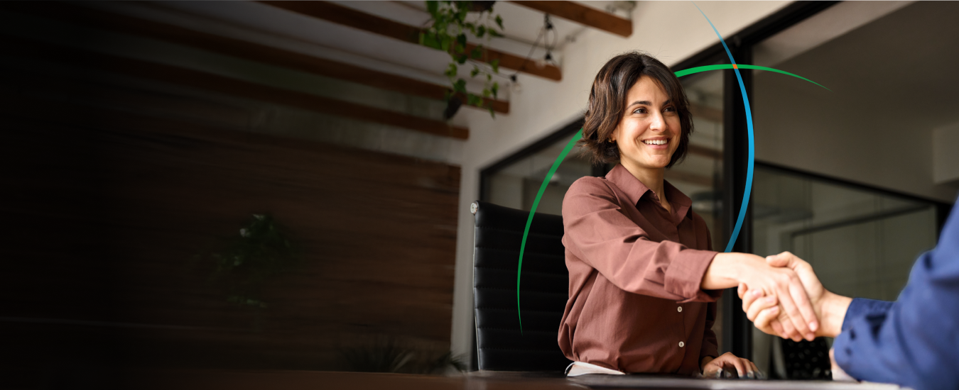 banner showing a business professional shaking hands with a customer