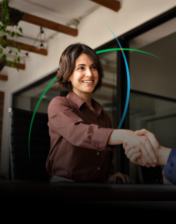 banner showing a business professional shaking hands with a customer