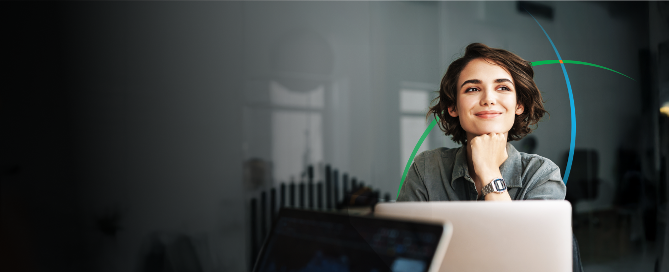 banner showing a woman with a thoughtful expression sitting in front of a laptop